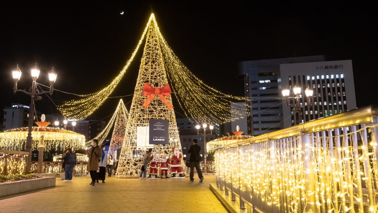 A street lined with tens of thousands of small lights at night